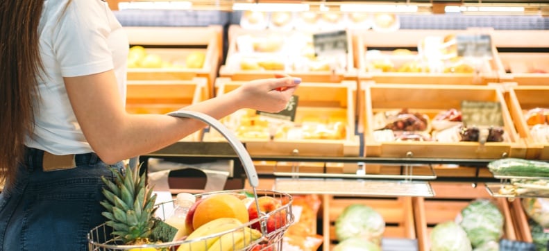 Woman shopping for fresh produce