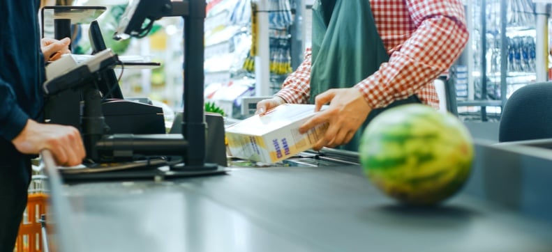 Cashier scanning product