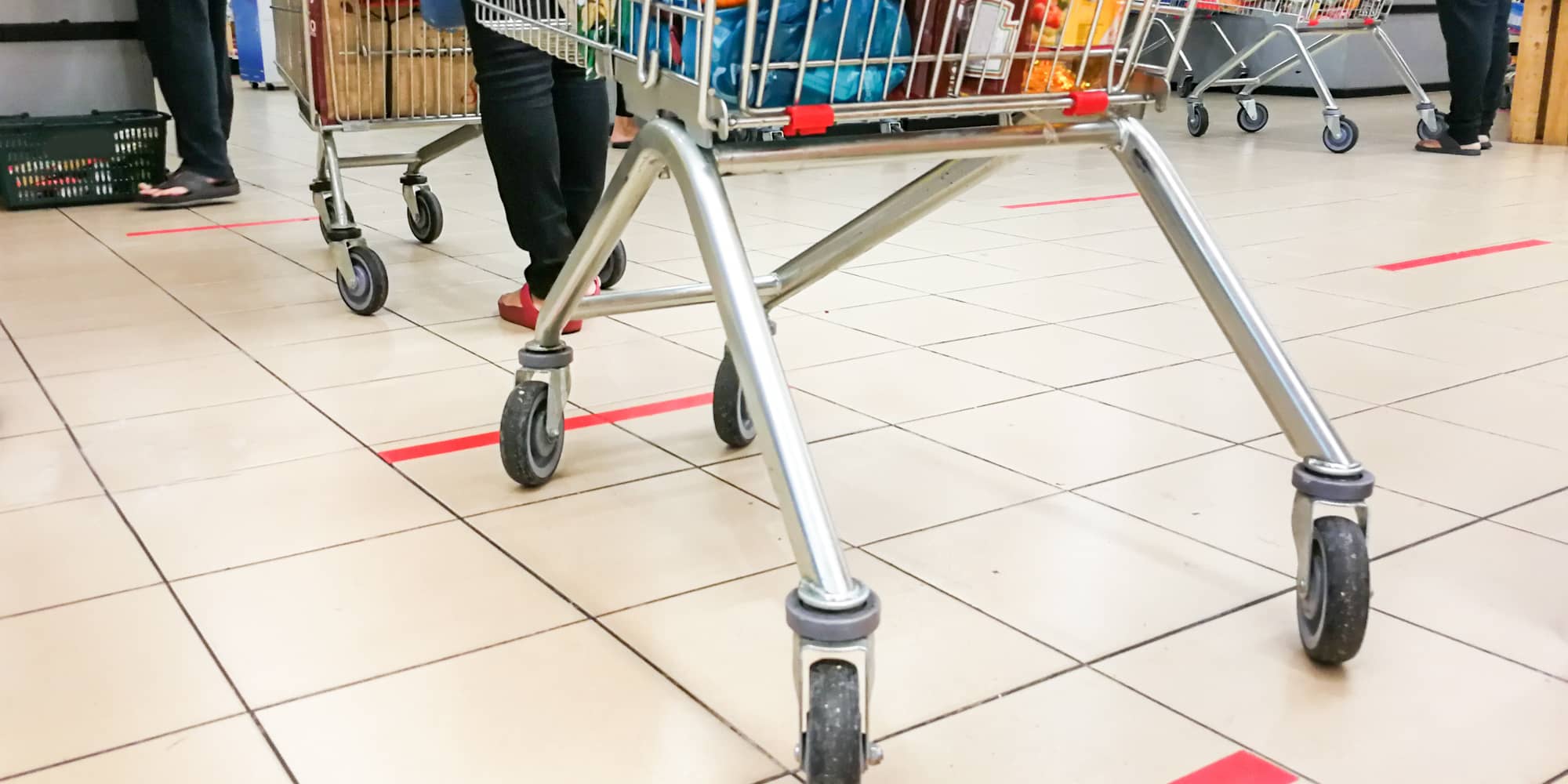 Shopping trolley in a socially distanced retail store layout
